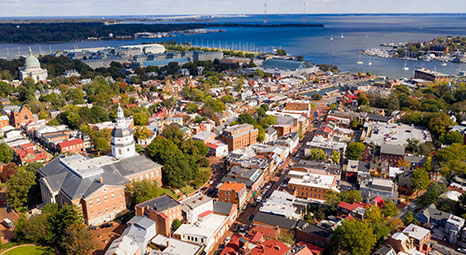 Aerial view of Annapolis, Maryland, with historic architecture and waterfront, illustrating real estate opportunities.