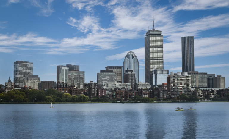 A panoramic view of the Boston skyline, depicting the urban landscape and real estate opportunities in Massachusetts.