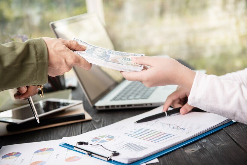 A person giving hard money loan to another 