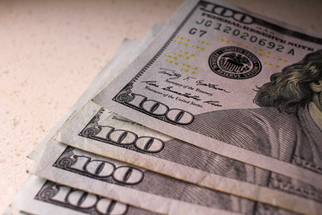 A closeup of 100-dollar banknotes