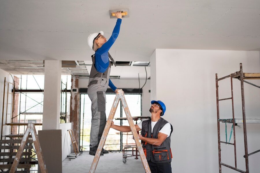 professional renovators at work in a residence being flipped
