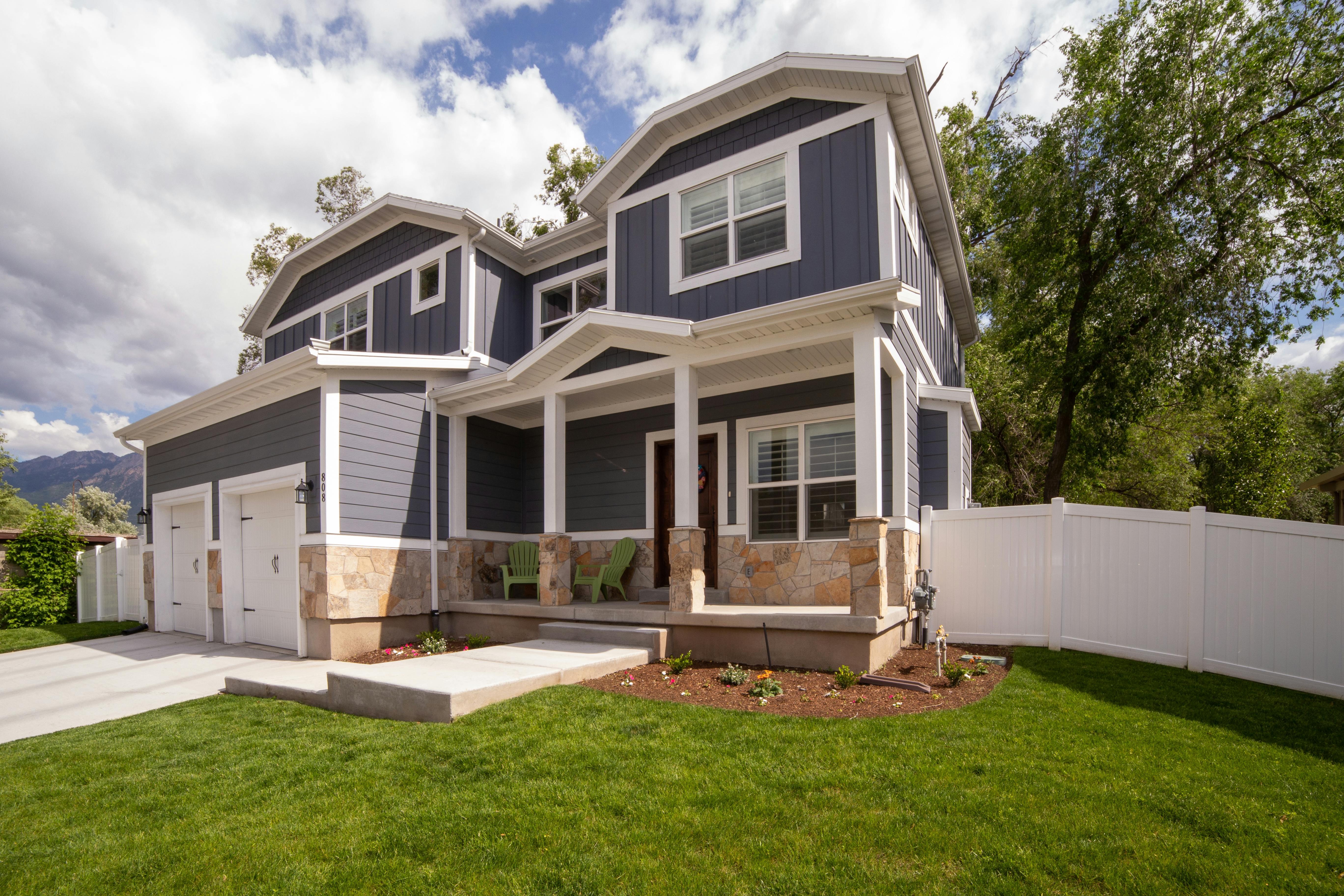 A house exterior with a lawn