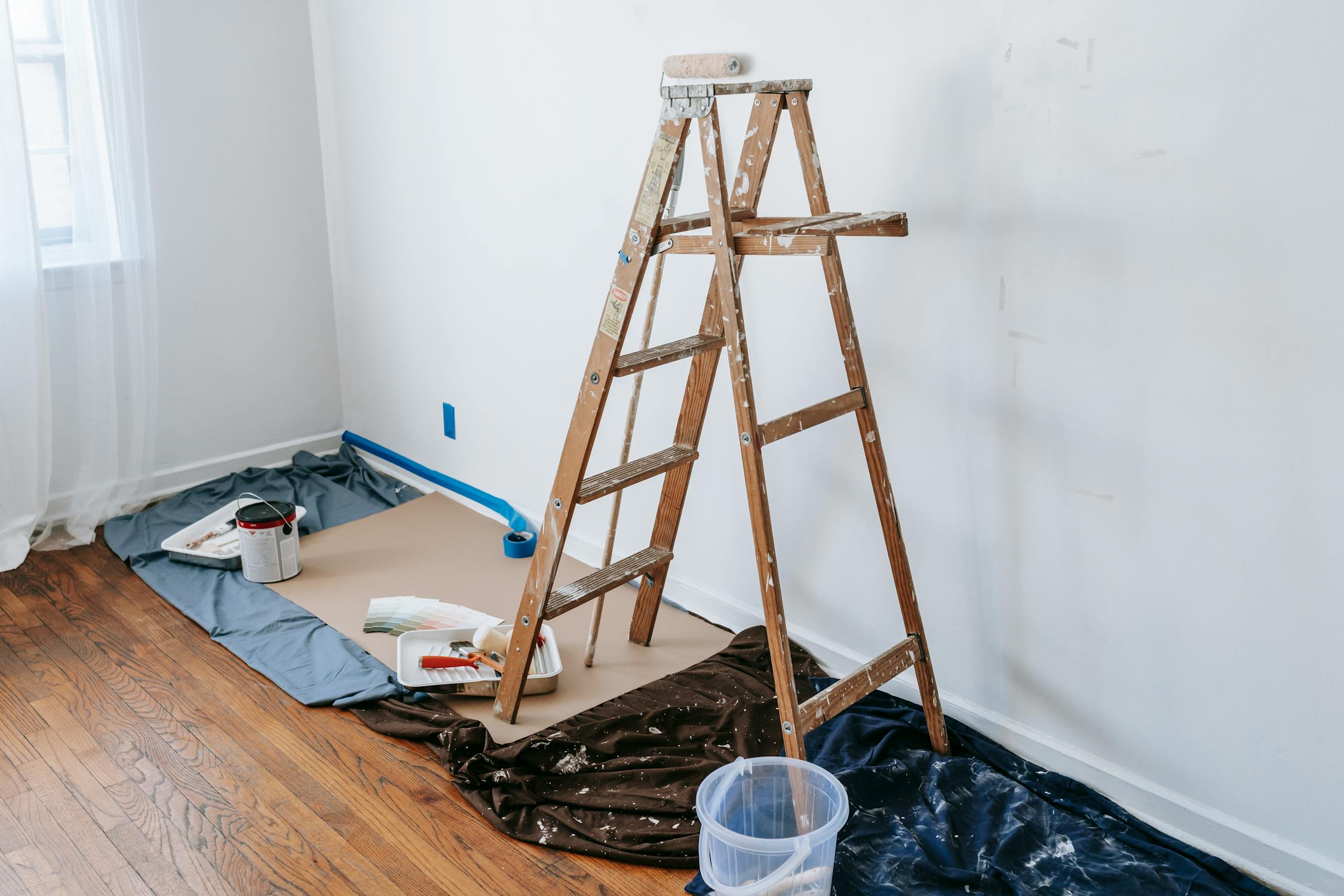 A wooden stepladder inside a house