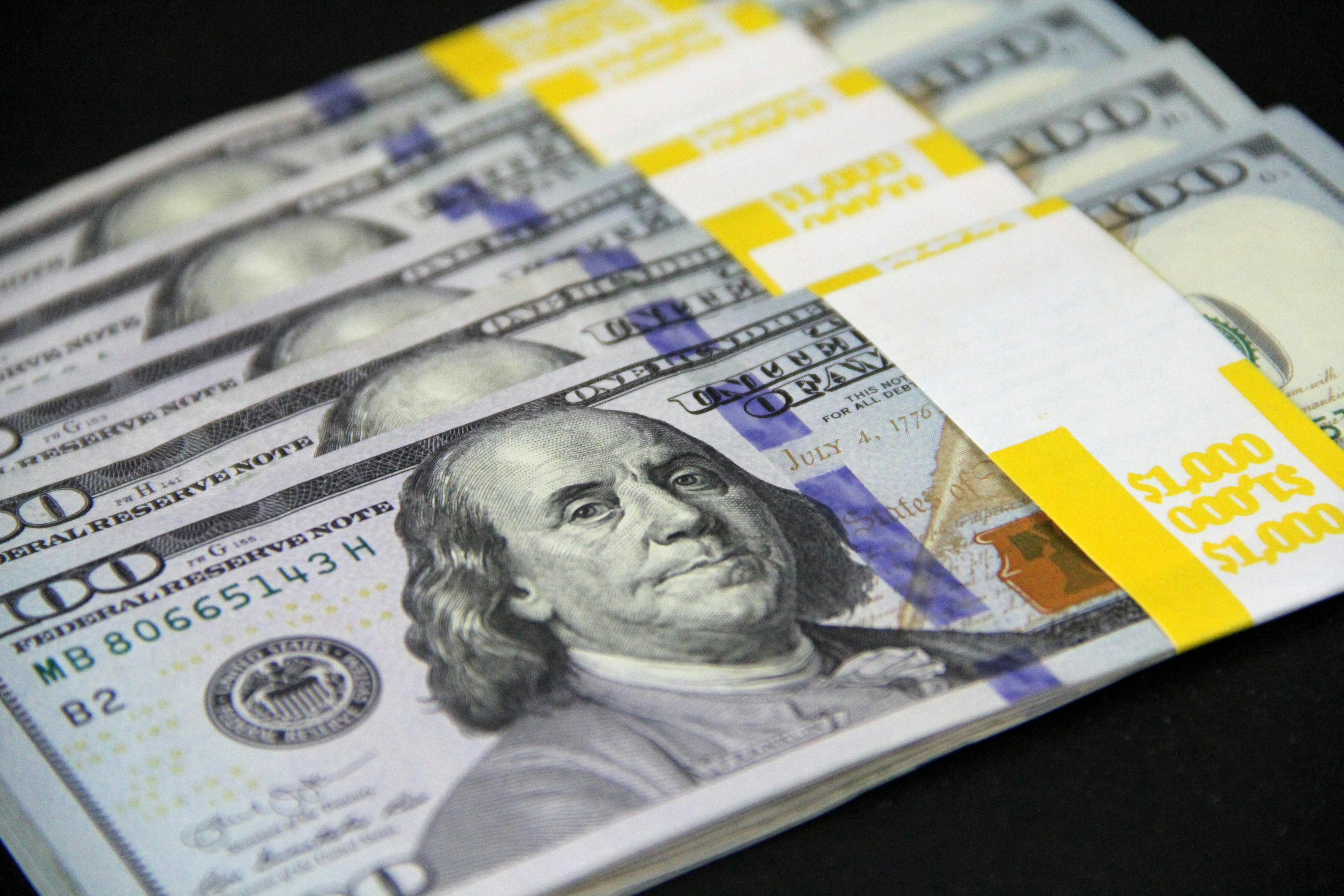 Bundles of 100 dollar banknotes