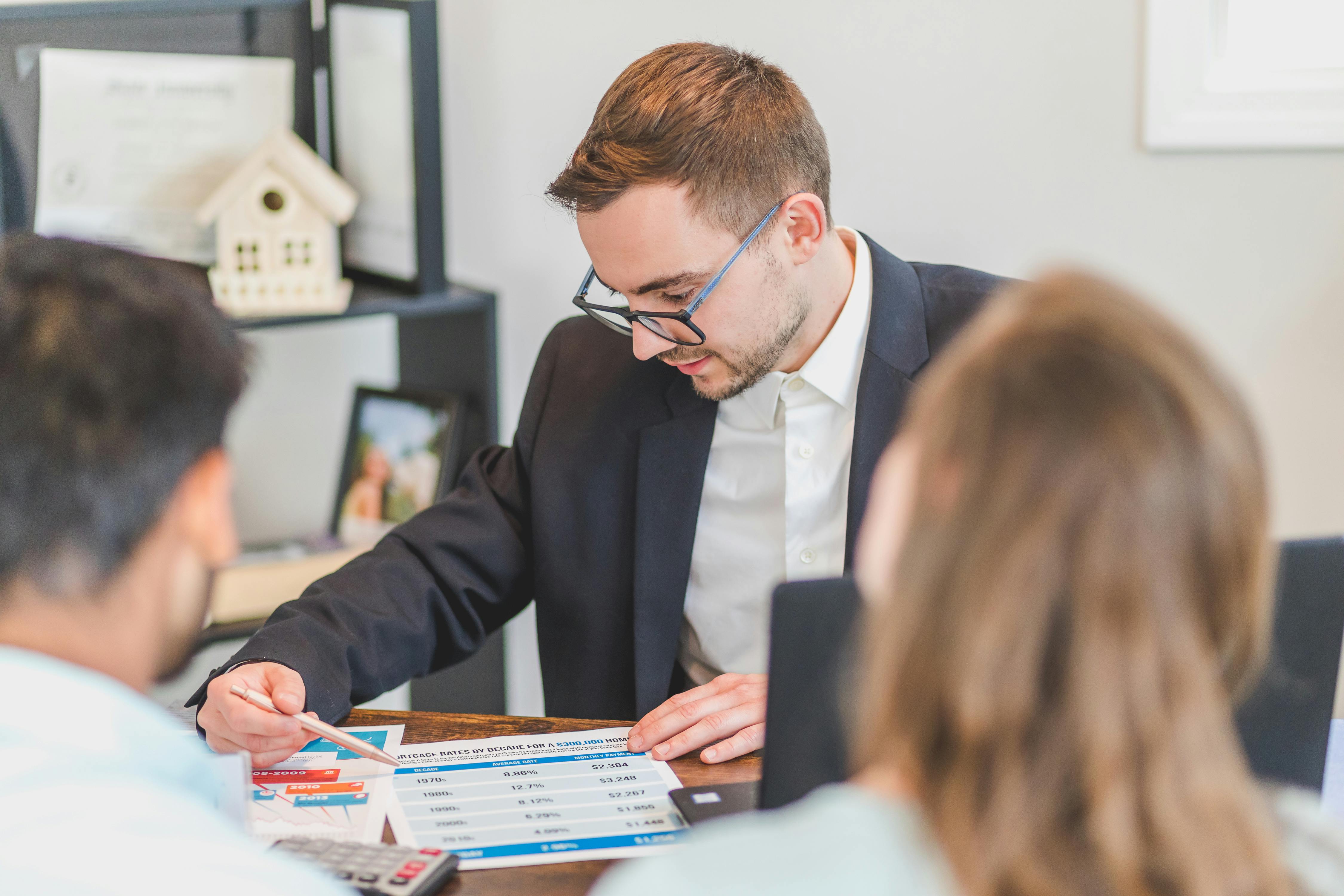 A hard money lender having a meeting with clients