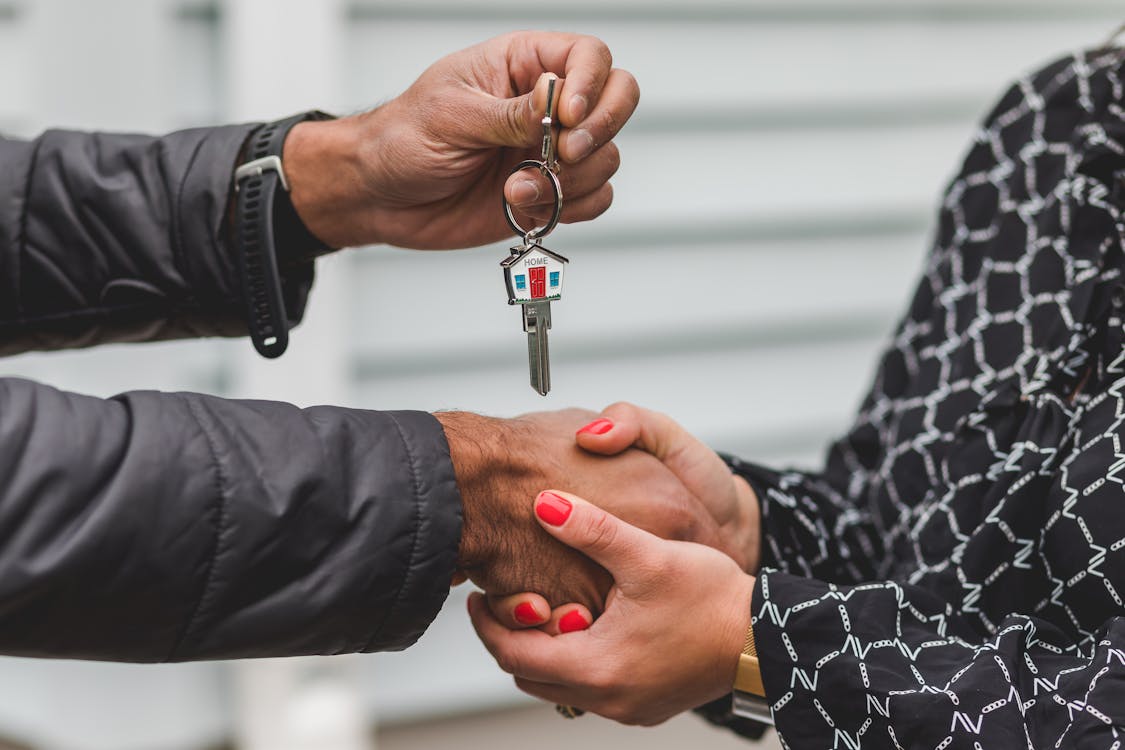 person giving rental property key
