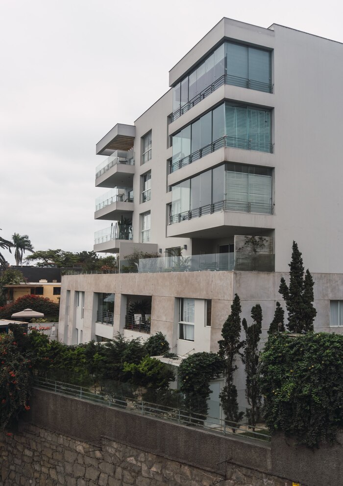 luxurious-apartments-building-surrounded-by-trees-plants-peru_321506-62 luxurious-apartments-building-surrounded-by-trees-plants-peru_321506-62